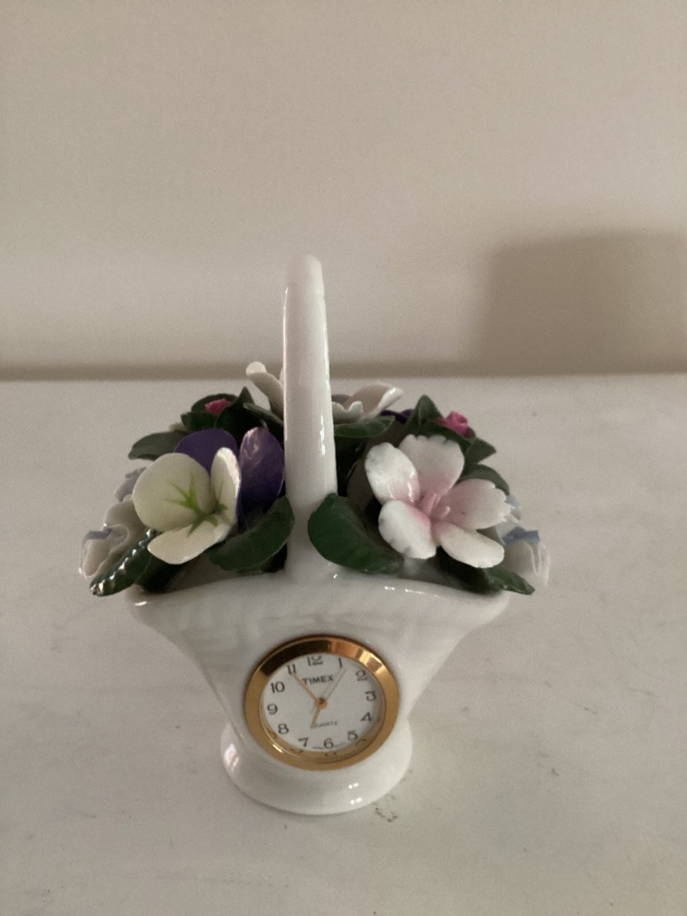 Capodemonte style Basket Figure with watch face